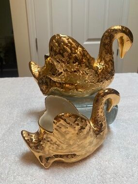 Two Vintage Park Ave. 22 Kt Gold Ceramic Swans.